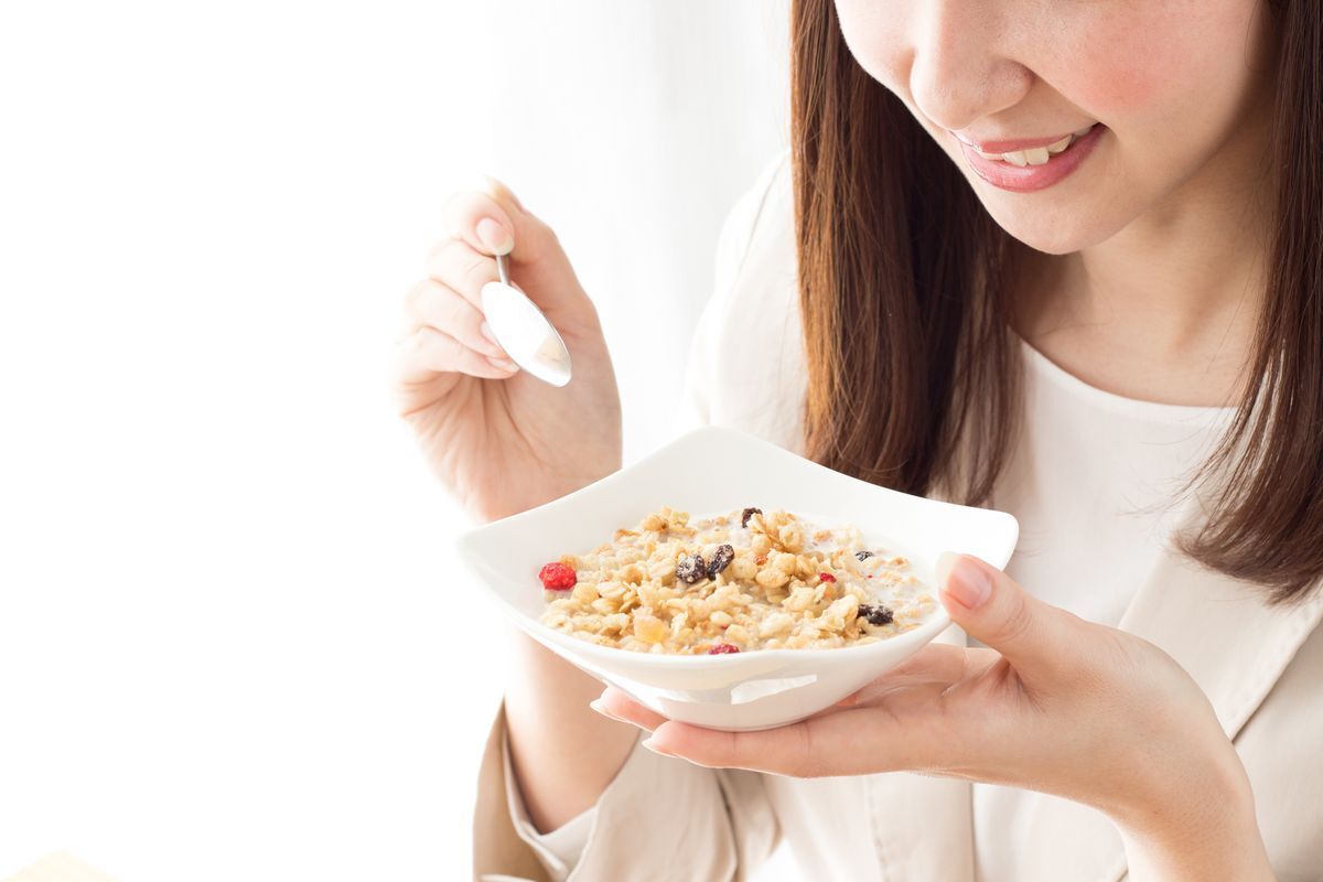 Woman eating breakfast 
