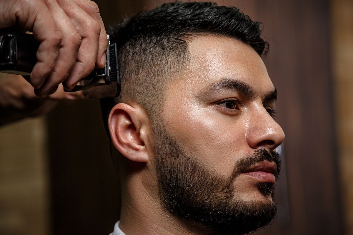 Man getting a haircut.