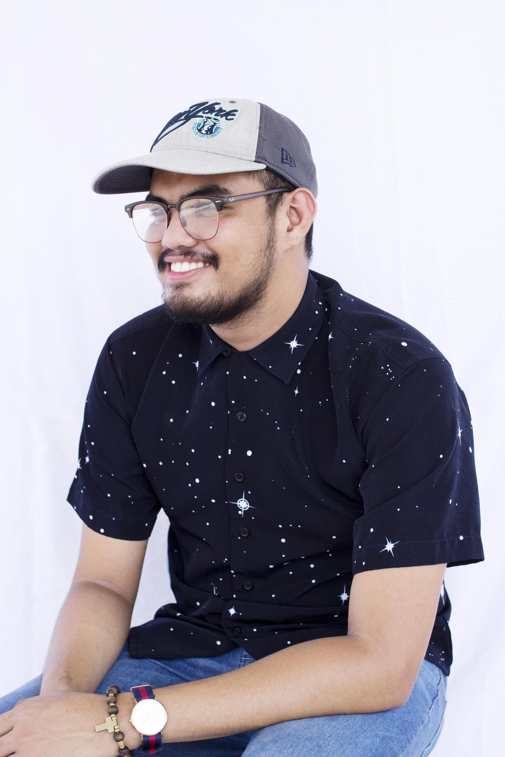 Asian man taking a mirror selfie