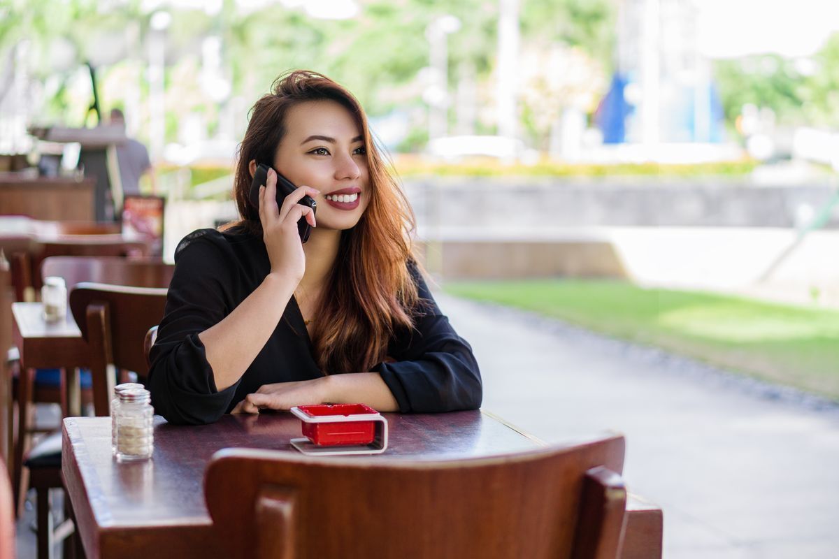 Filipino woman at a restaurant alone