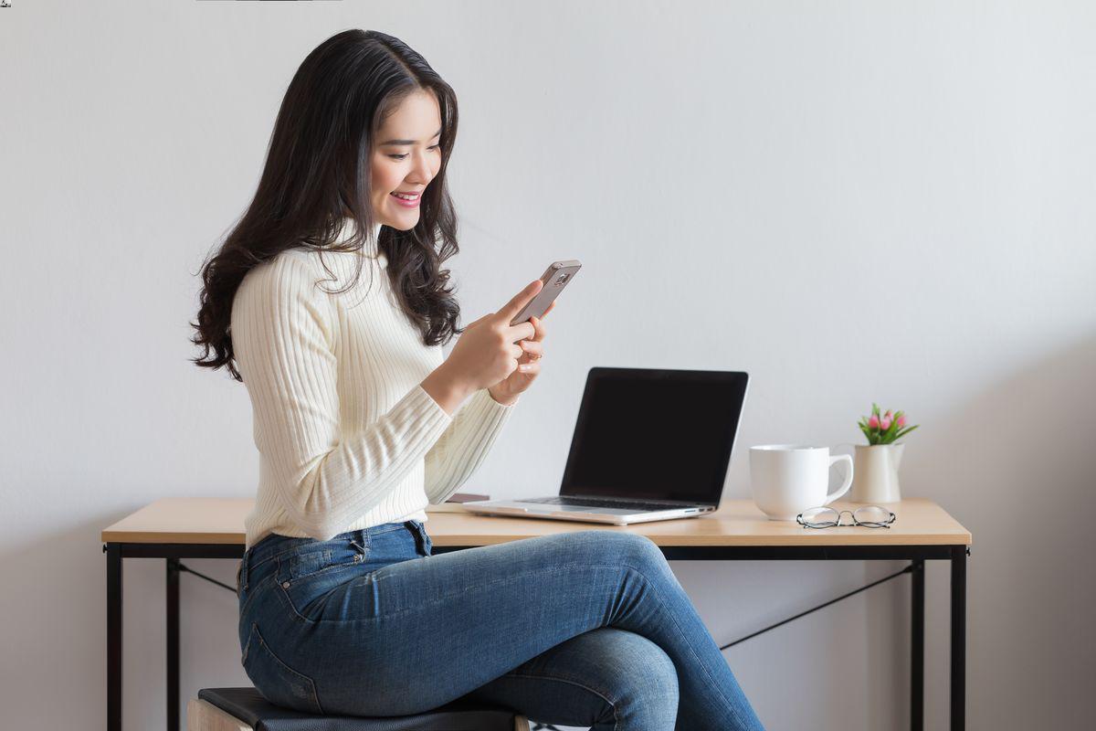 Asian woman working from home