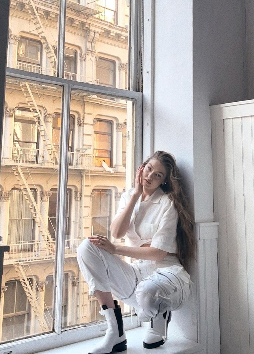 Photo of a woman wearing cargo pants with a shirt