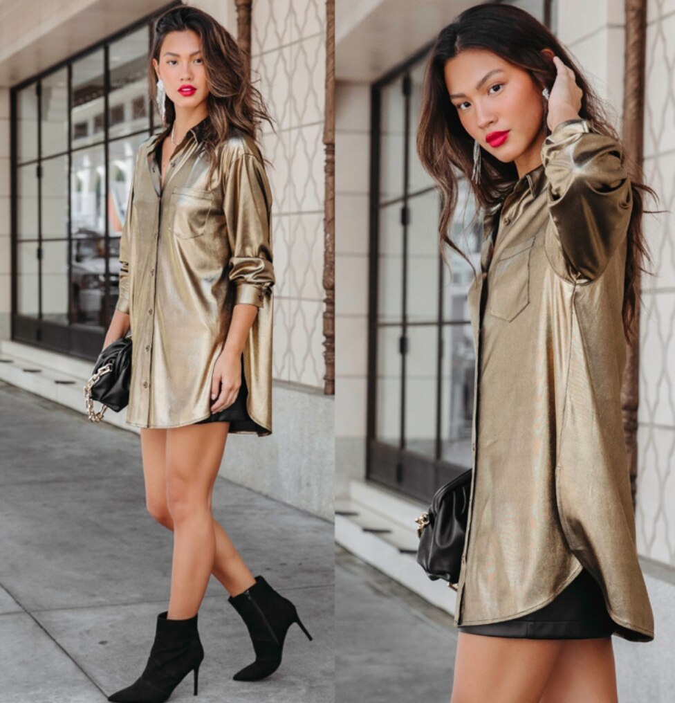 A photo of a woman wearing gold boots and a woman wearing gold button down top