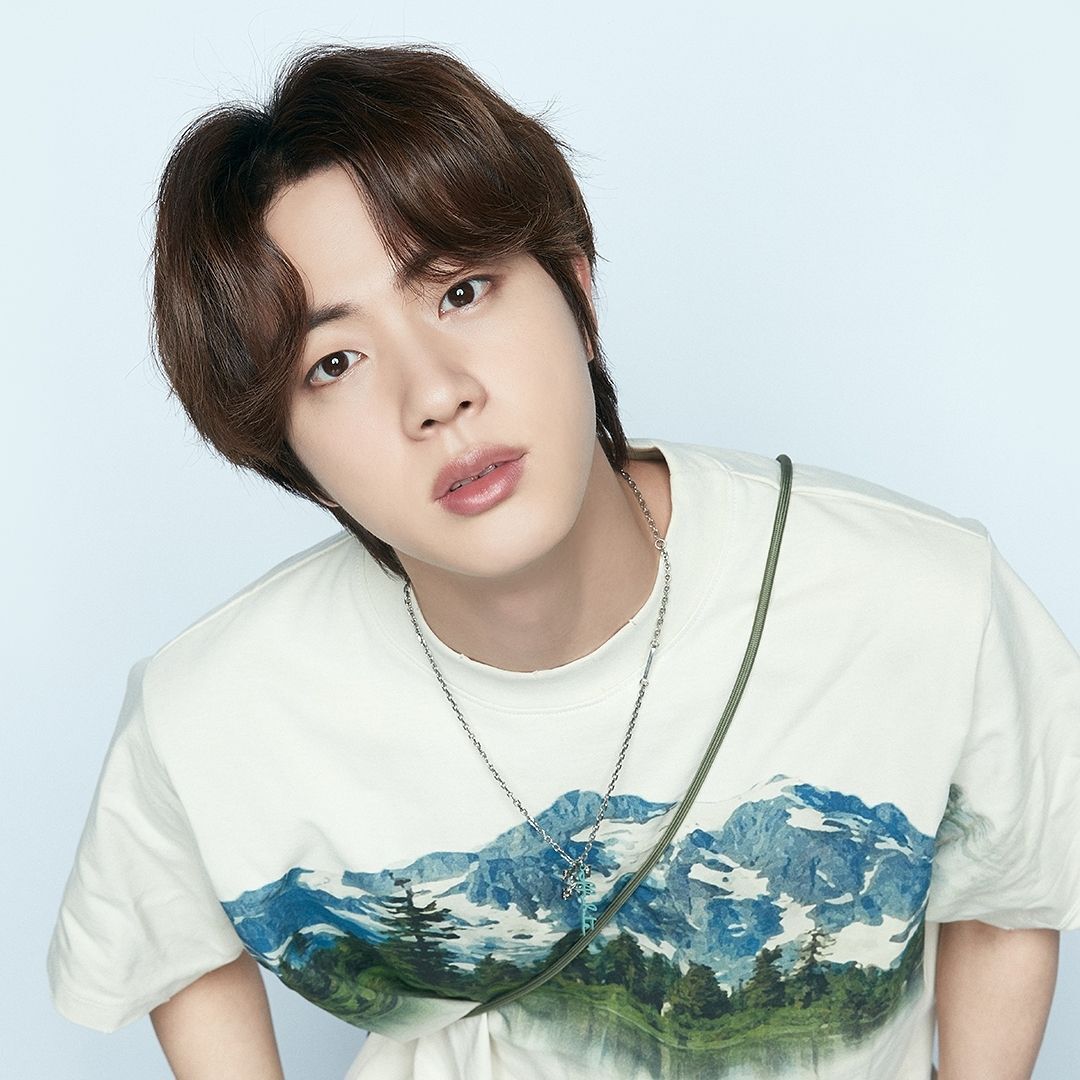 BTS’ Jin rocks curtain bangs for men.