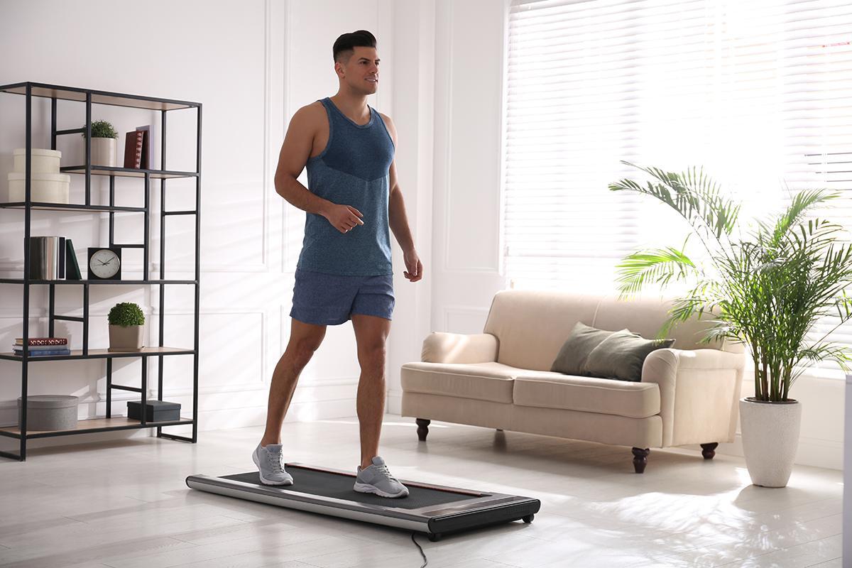 A man runs on a treadmill