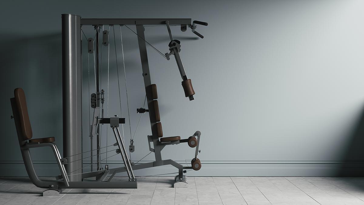A large home gym machine fills most of a room