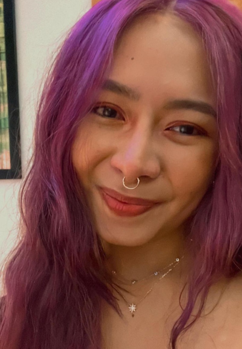 Filipino female artist, Sunny Tolentino, with colored hair and nose ring. 