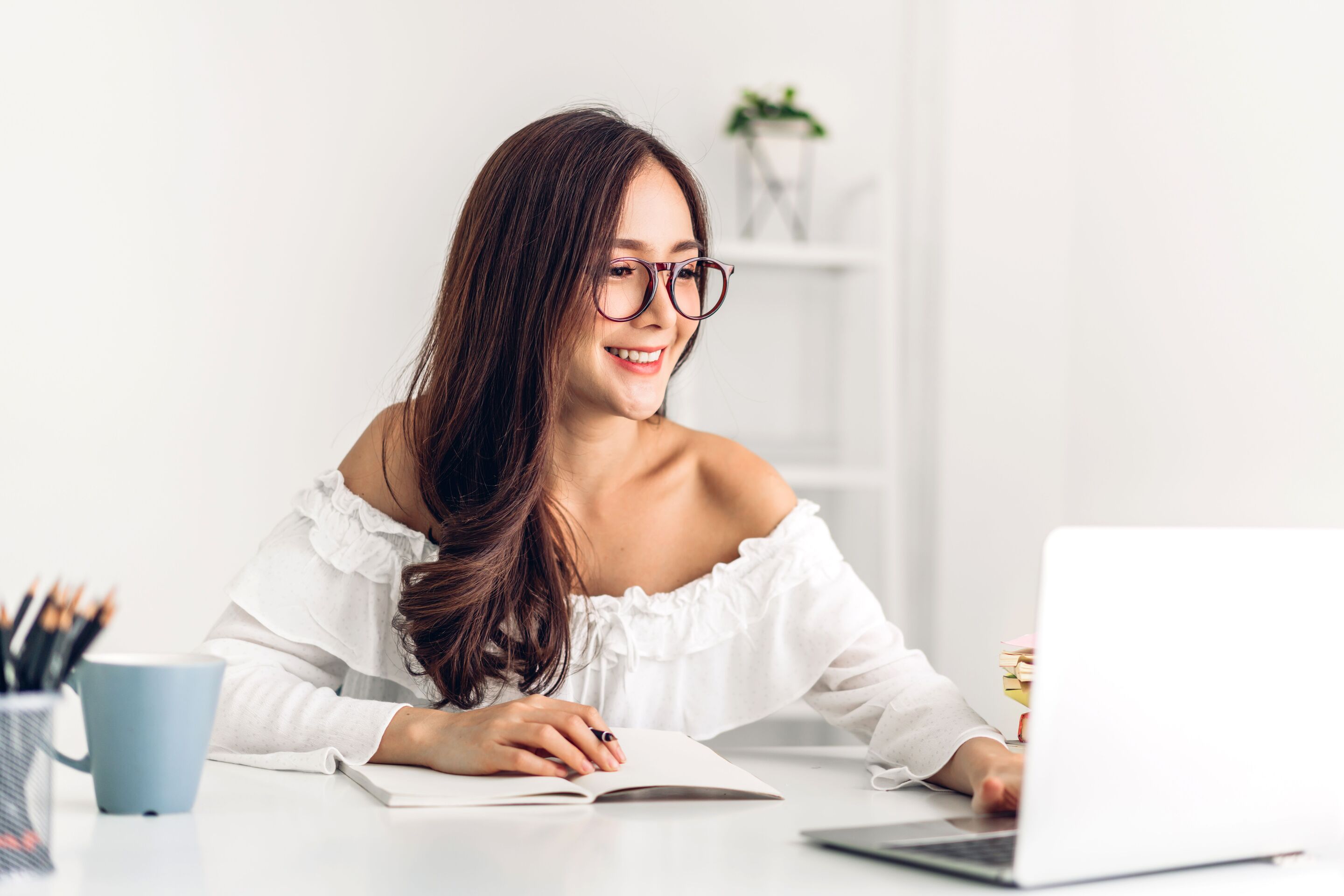 Smiling happy woman while working.