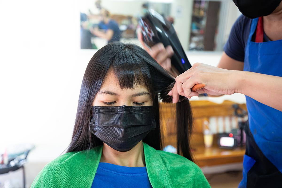 Asian woman with getting treatment at salon