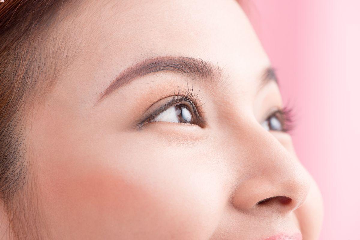 Asian woman with makeup and long eyelashes