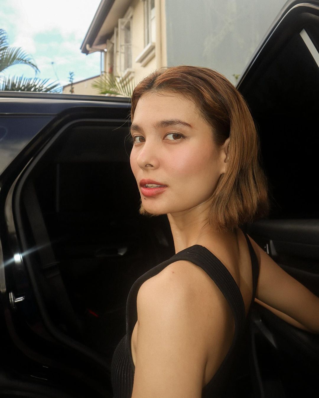 A portrait of Anji Salvacion with a bob and minimal makeup.