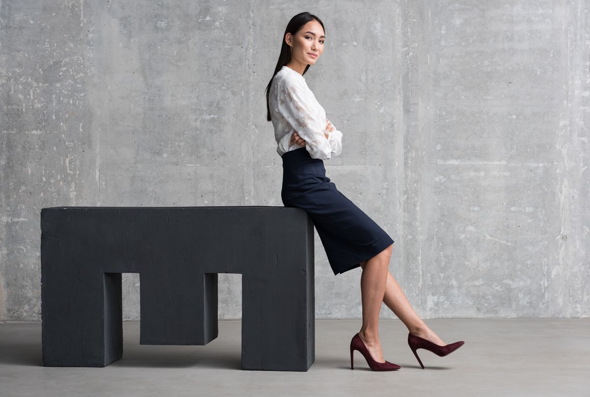 An Asian woman who looks put together