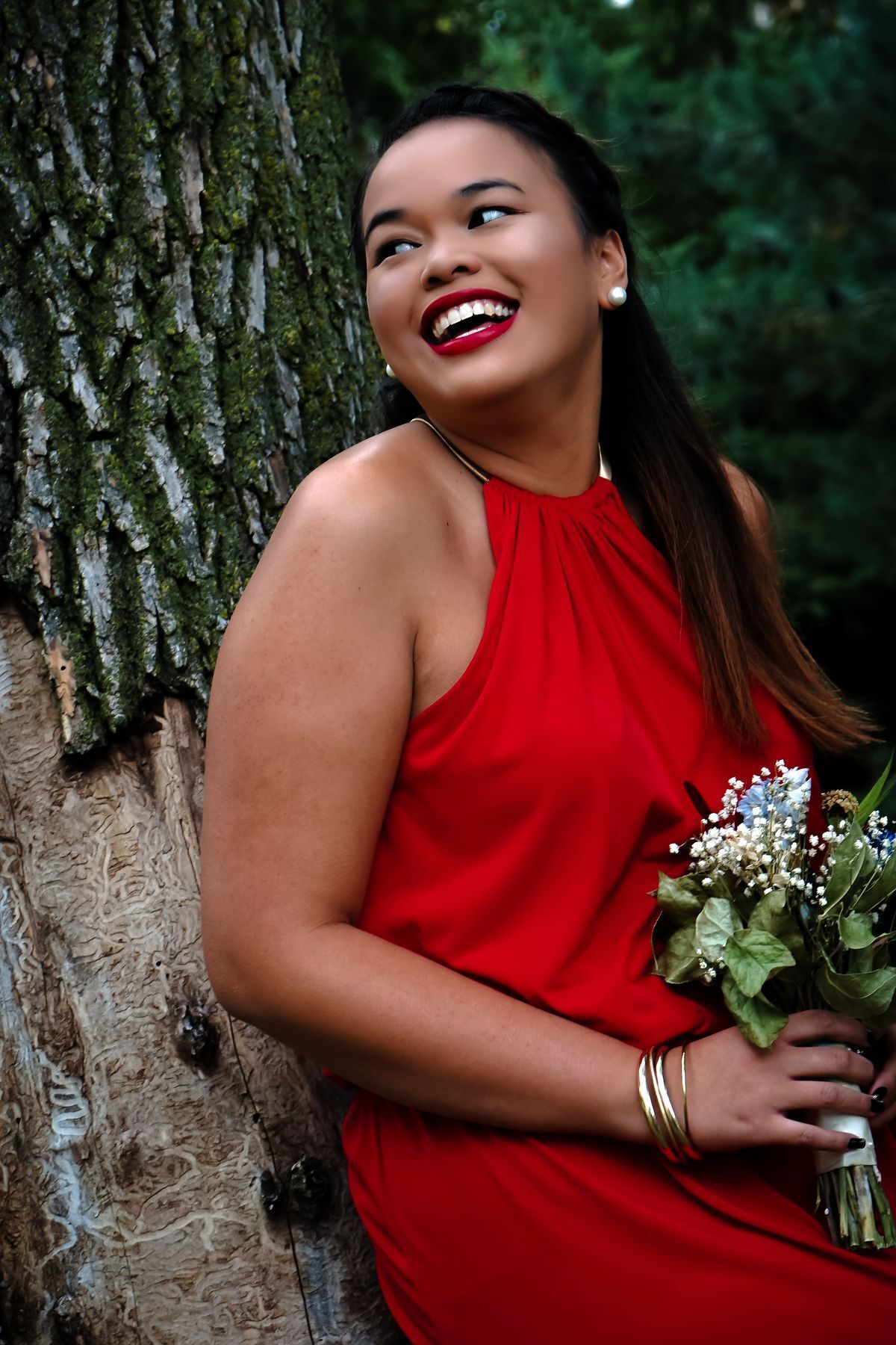 Asian woman in red dress