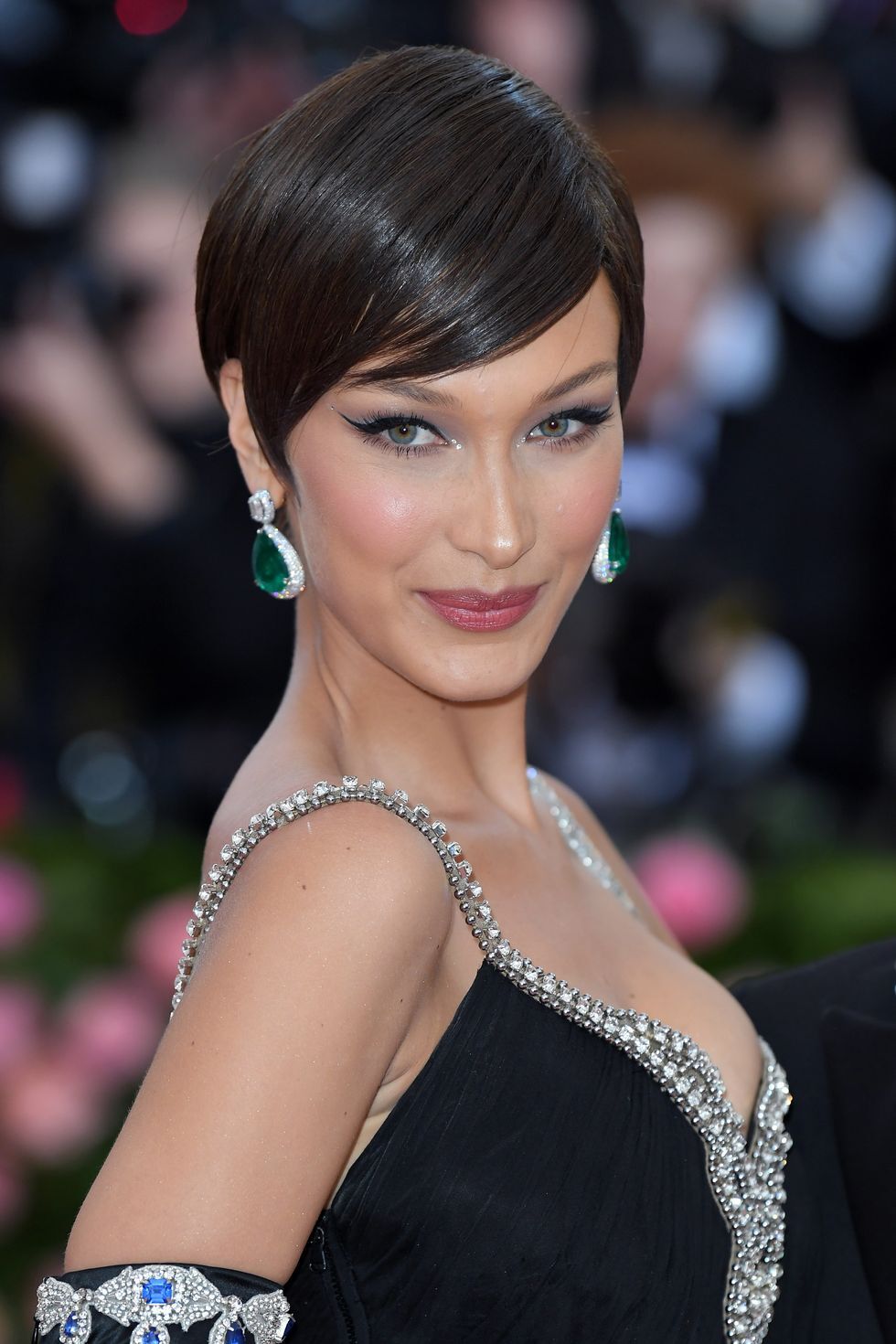 Play around with your side part like Bella Hadid