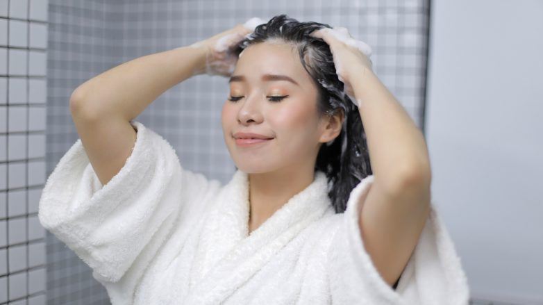 girl rinsing hair
