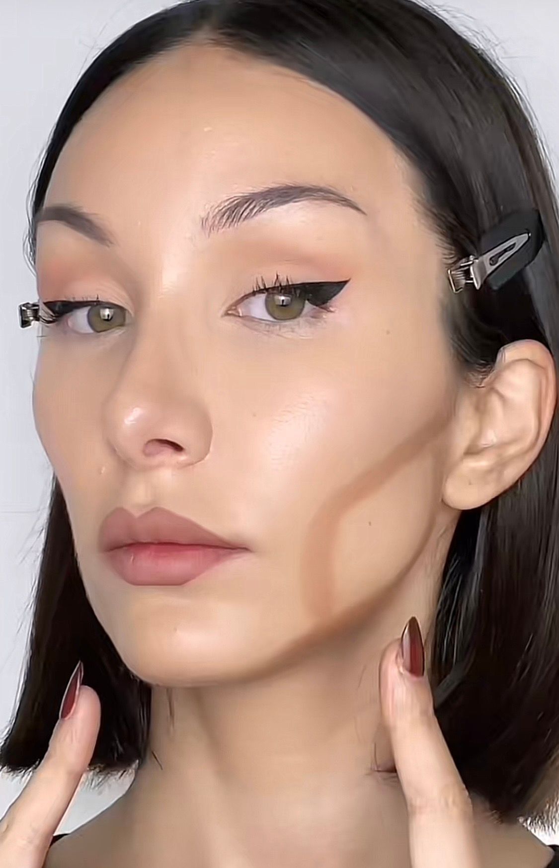 A portrait of woman showing how to contour oval-shaped face.