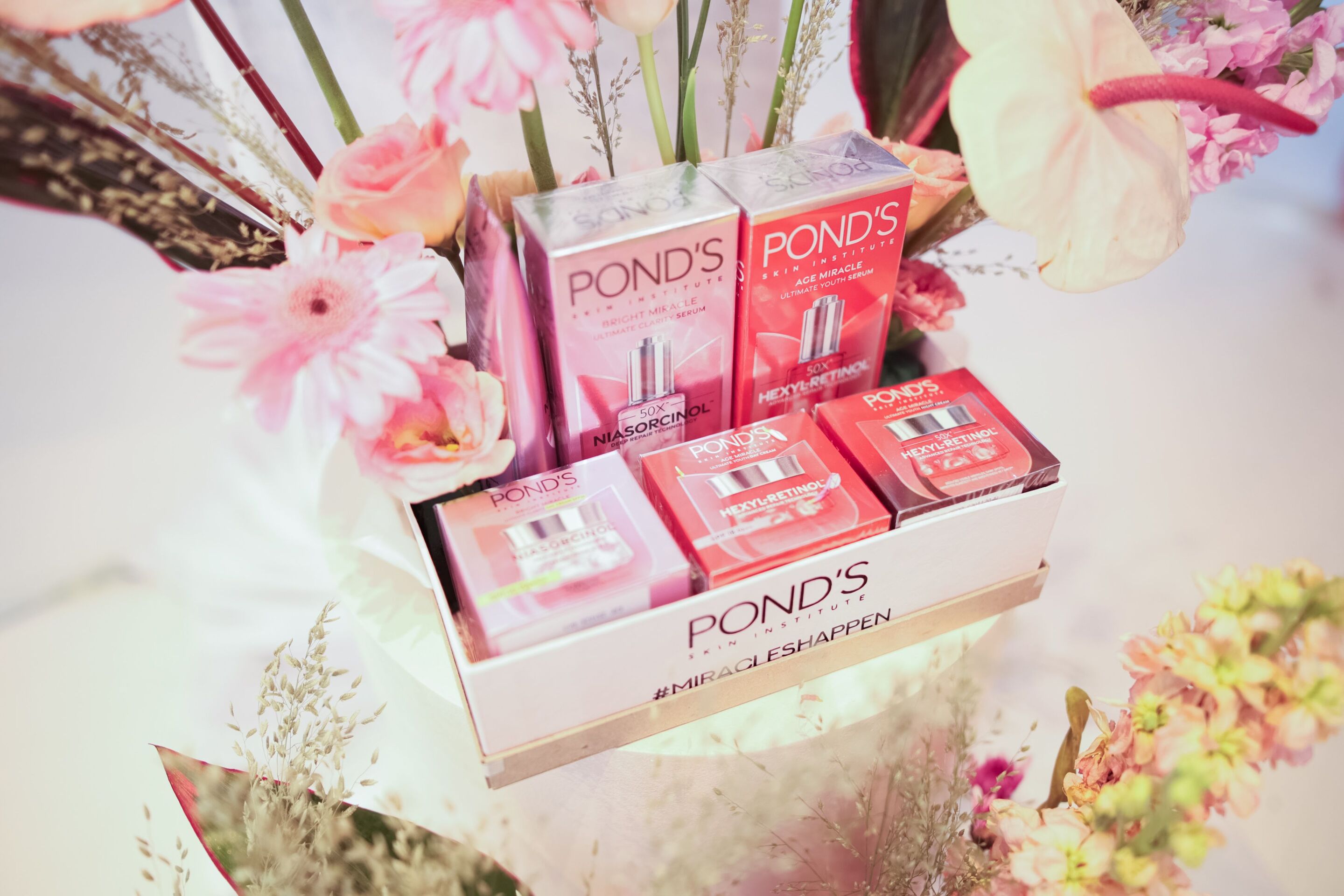 A photo of POND’S products in their packaging.