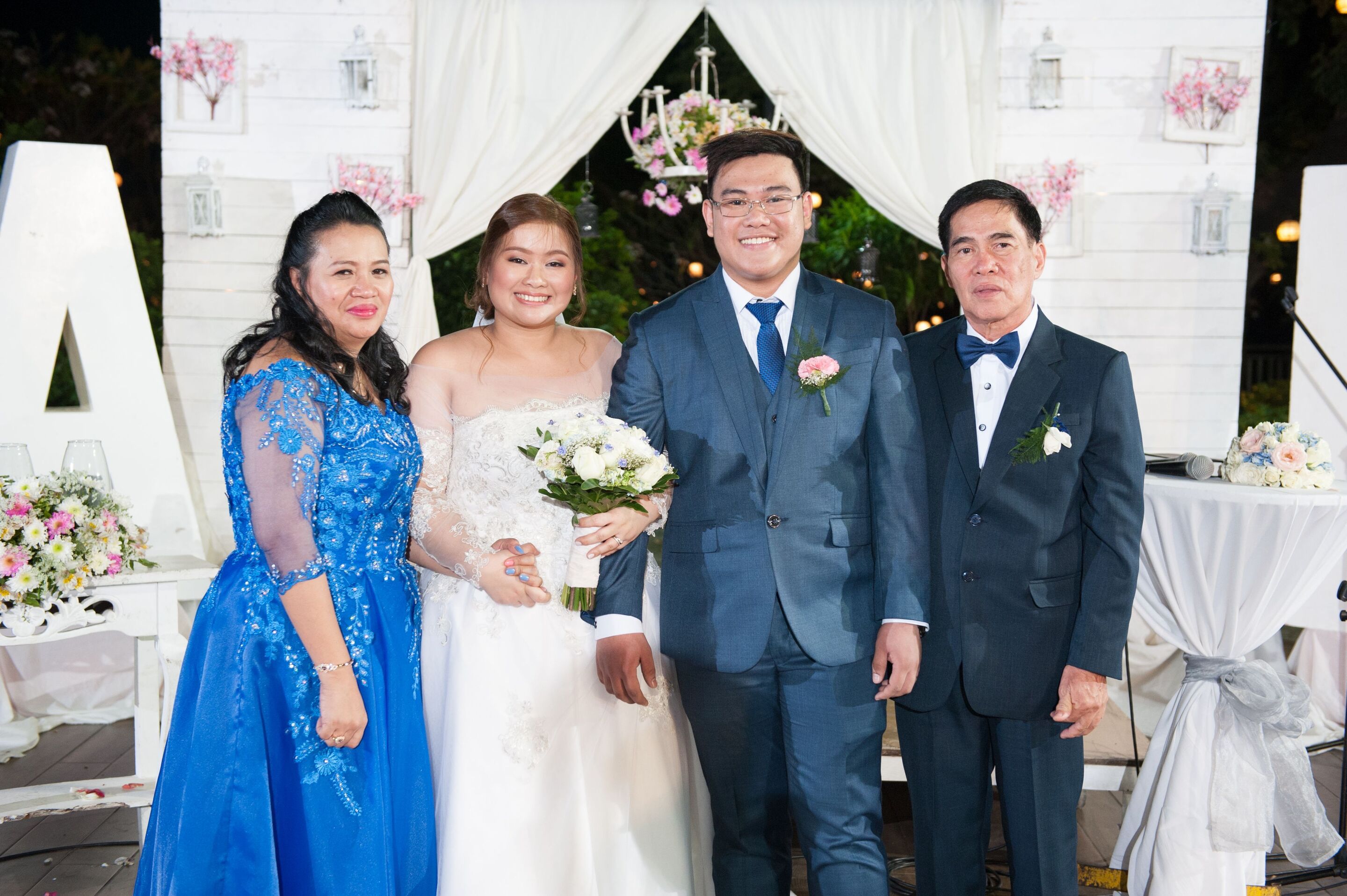 Kaye Arzadon with husband Andrew and parents-in-law, Rosemarie and Andy.