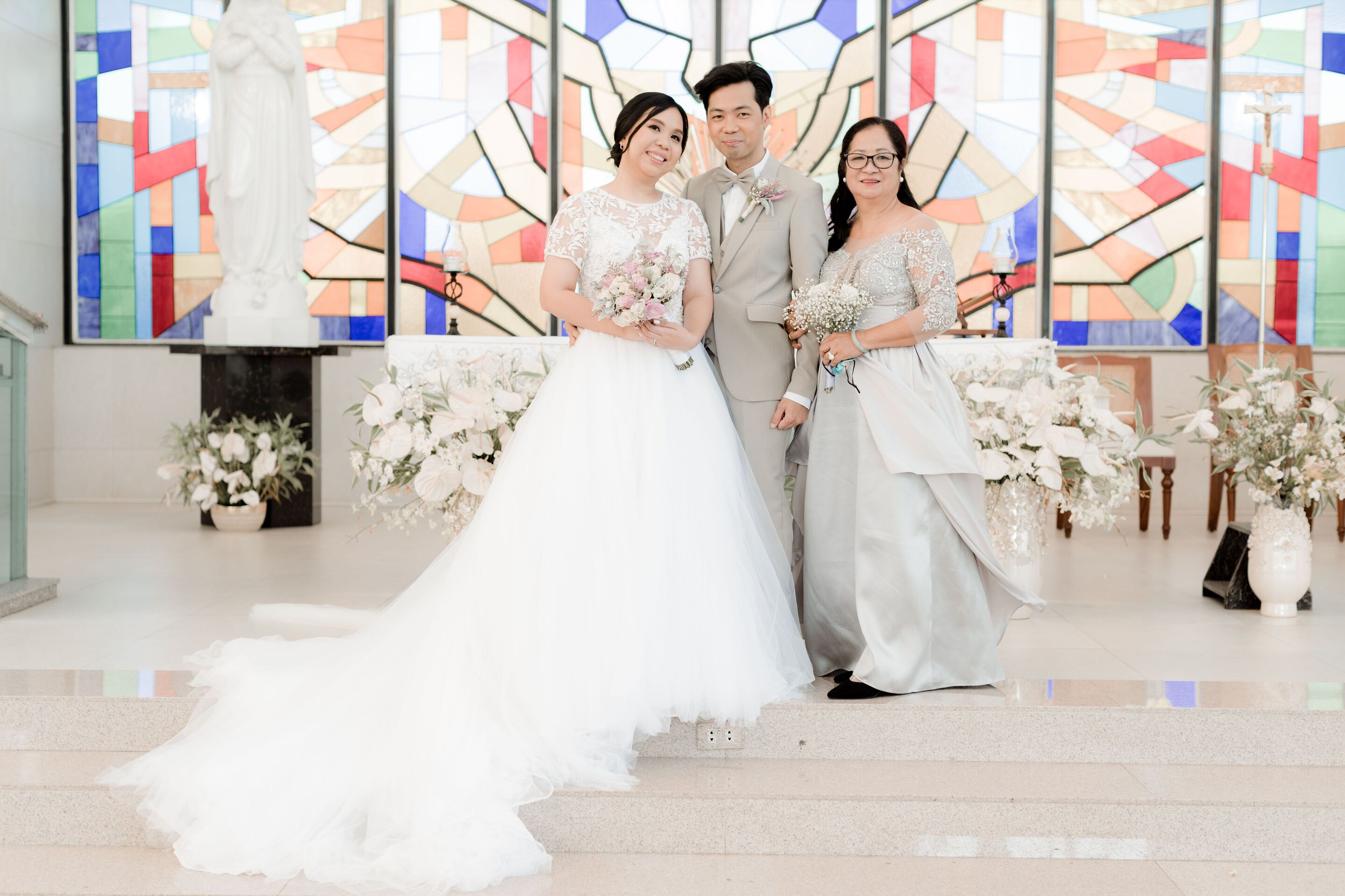 Kitty Elicay-Carpena with her husband Albert and his mom, Rikki.