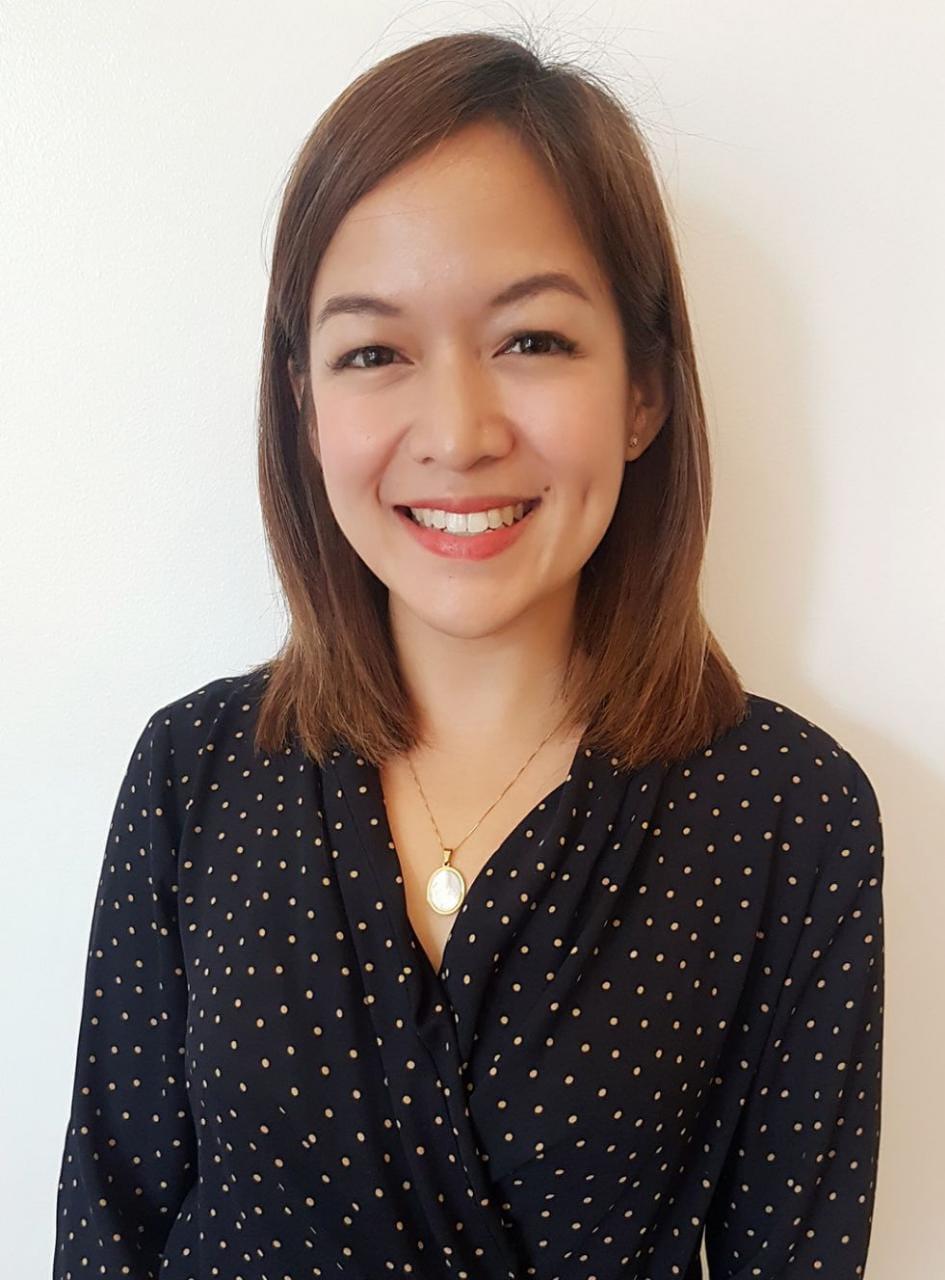 A woman in a black blouse