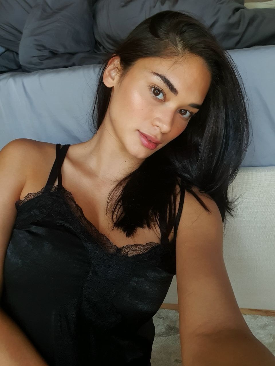 Pia Wurtzbach in a black top