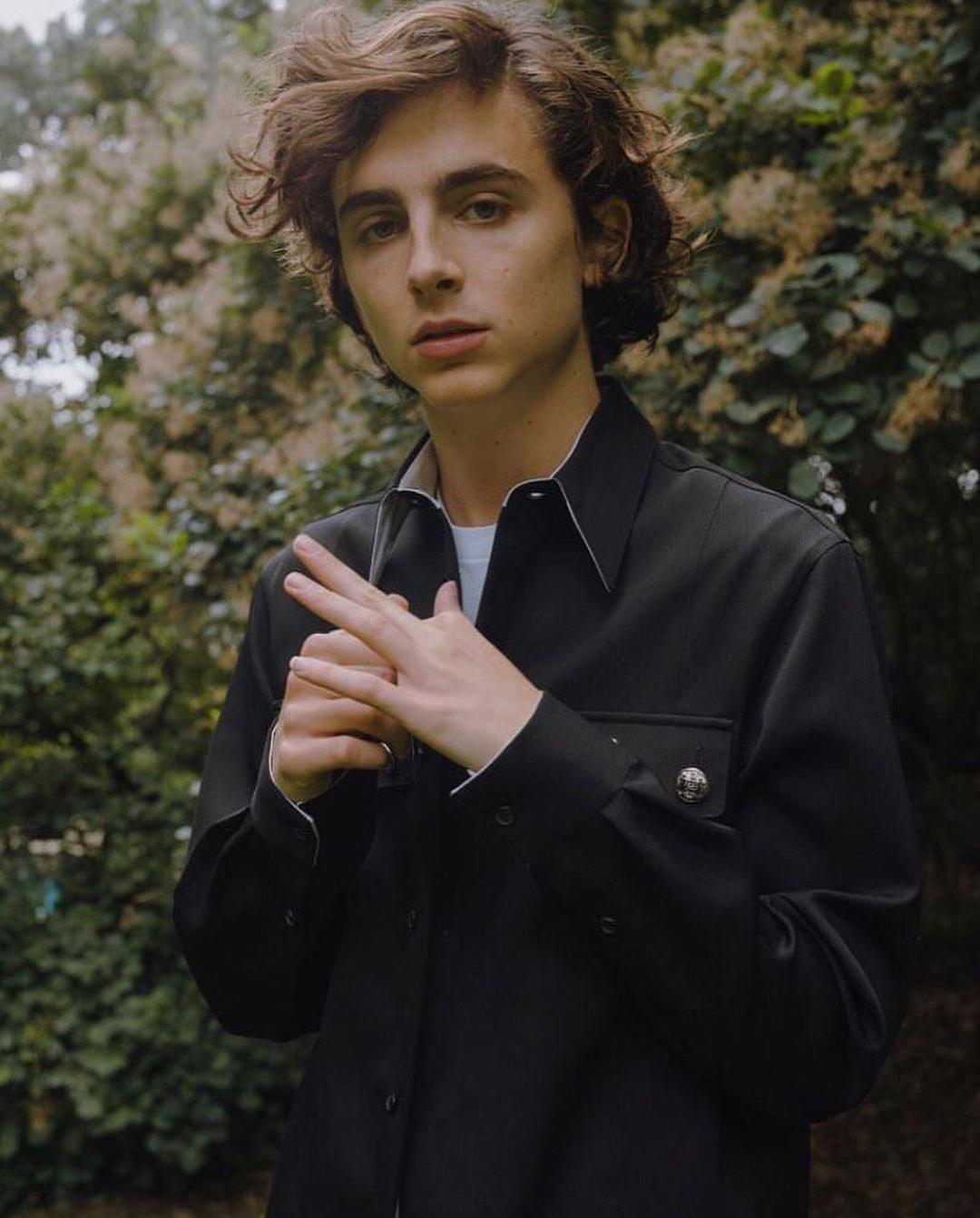 Timothée Chalamet in a black jacket 