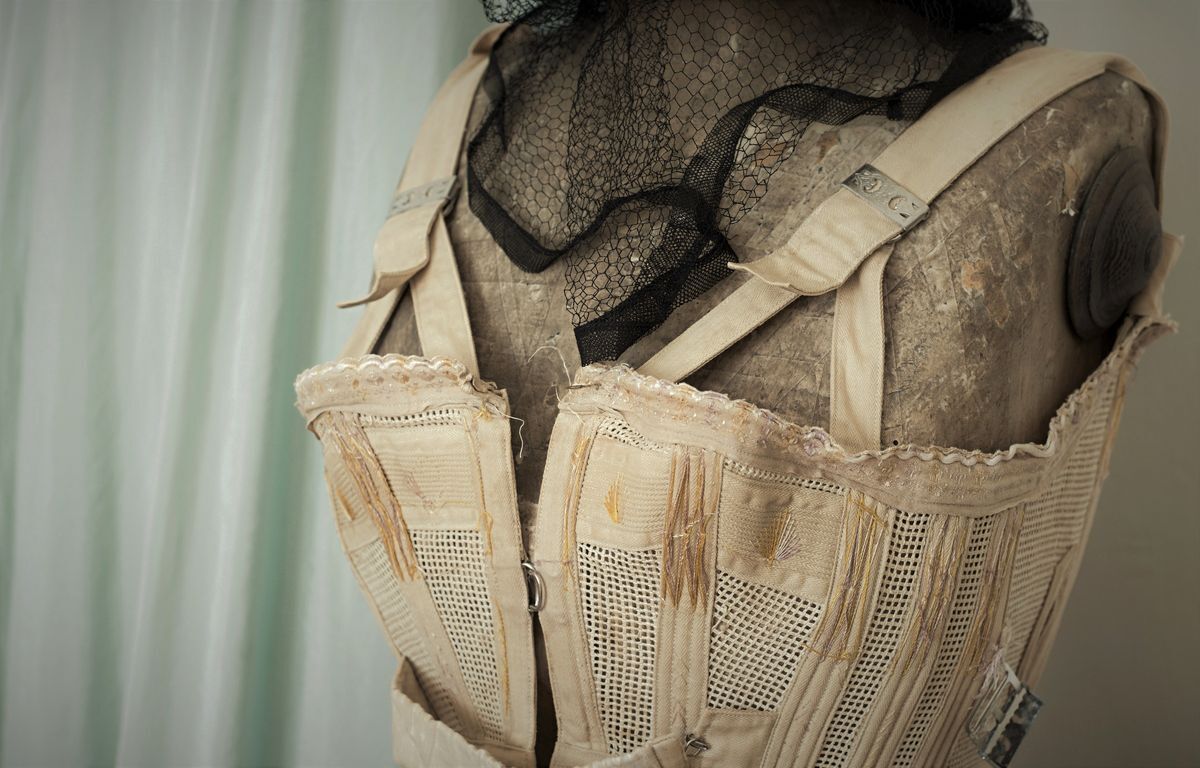 Antique corset on a mannequin.