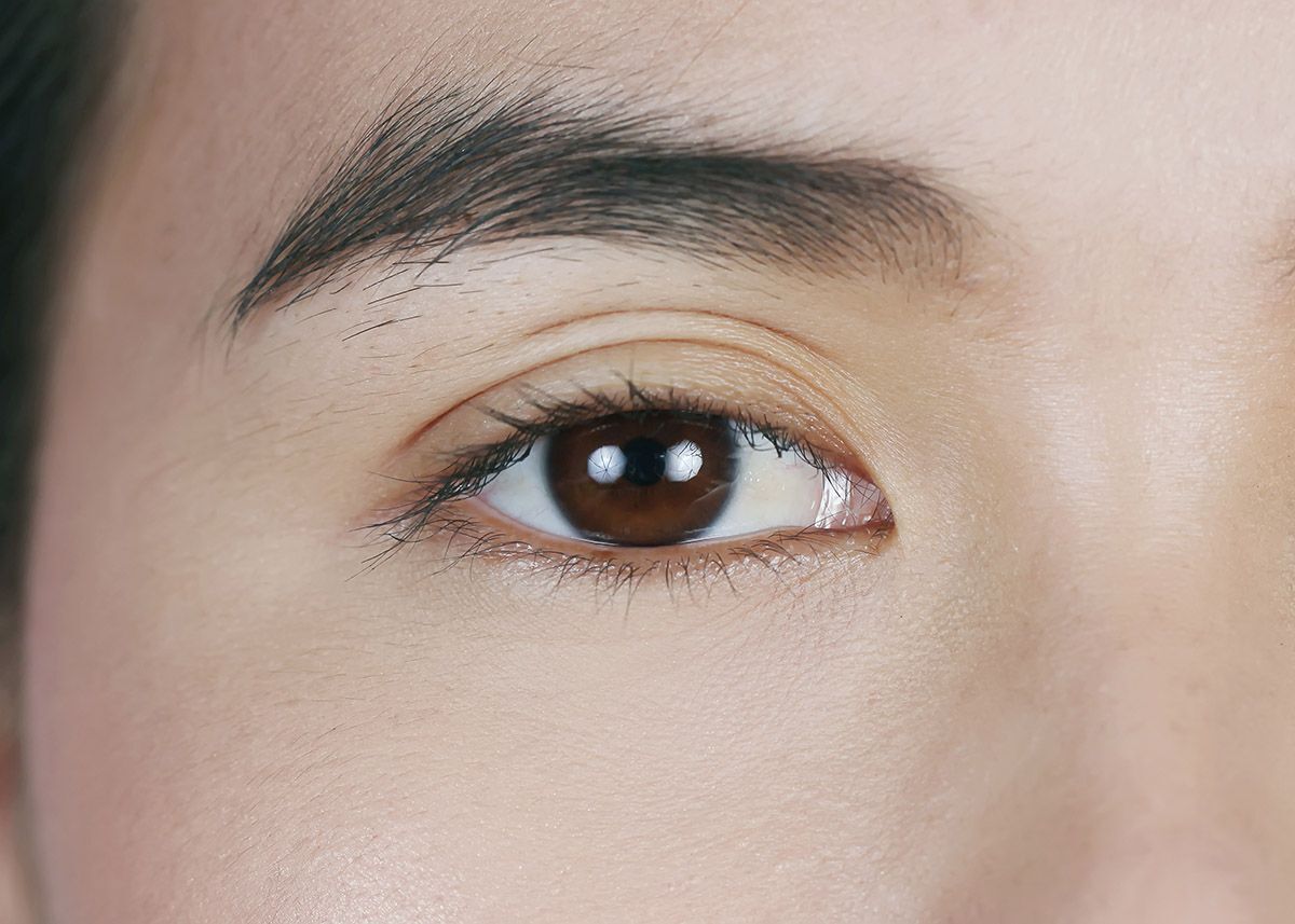 Asian woman with thick eyebrows