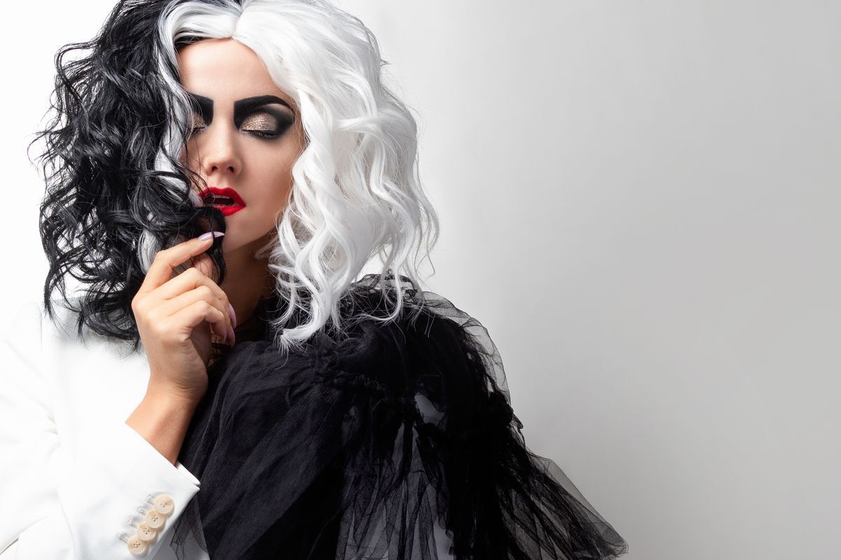 Photo of Emma Stone with half blonde and half black hair