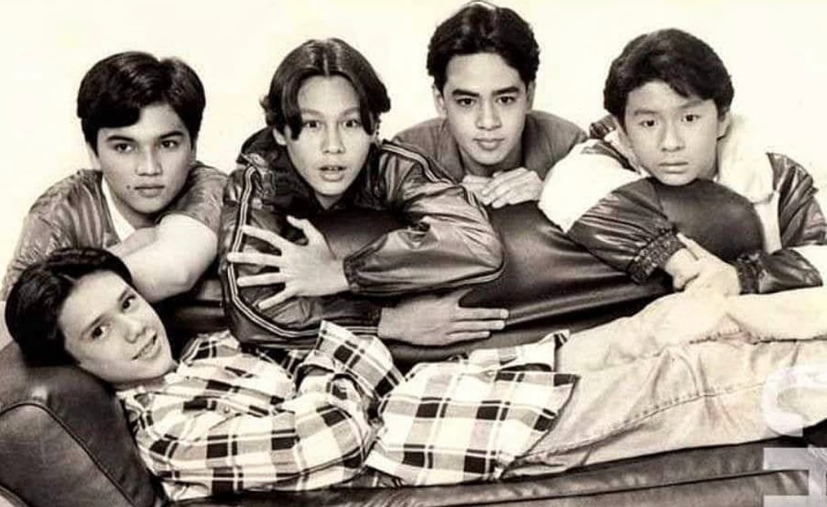Old black and white photo of a group of Filipino teenage boys.