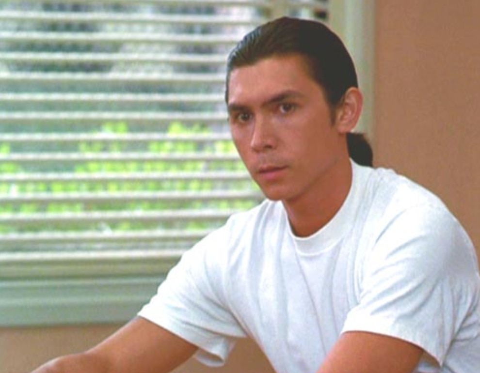 Old photo of actor Lou Diamond Phillips with a ponytail.