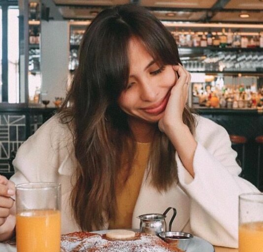 woman with curtain bangs