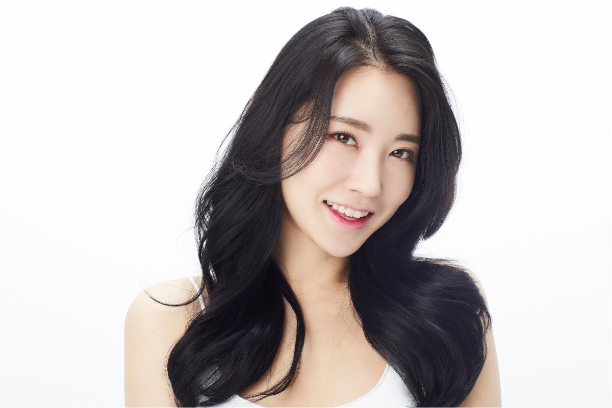 Tóc layer dài màu đen uốn nhẹ