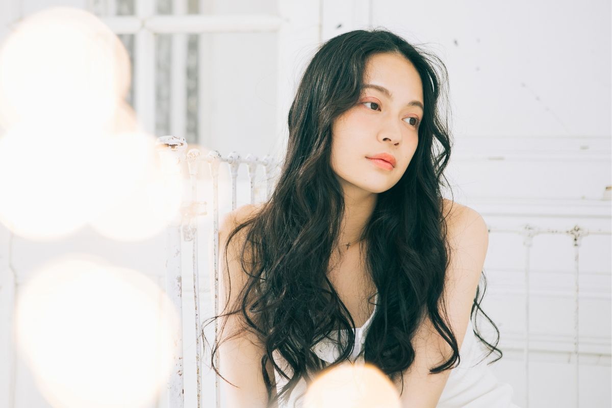 Tóc dài xoăn sóng nước cho mặt tròn