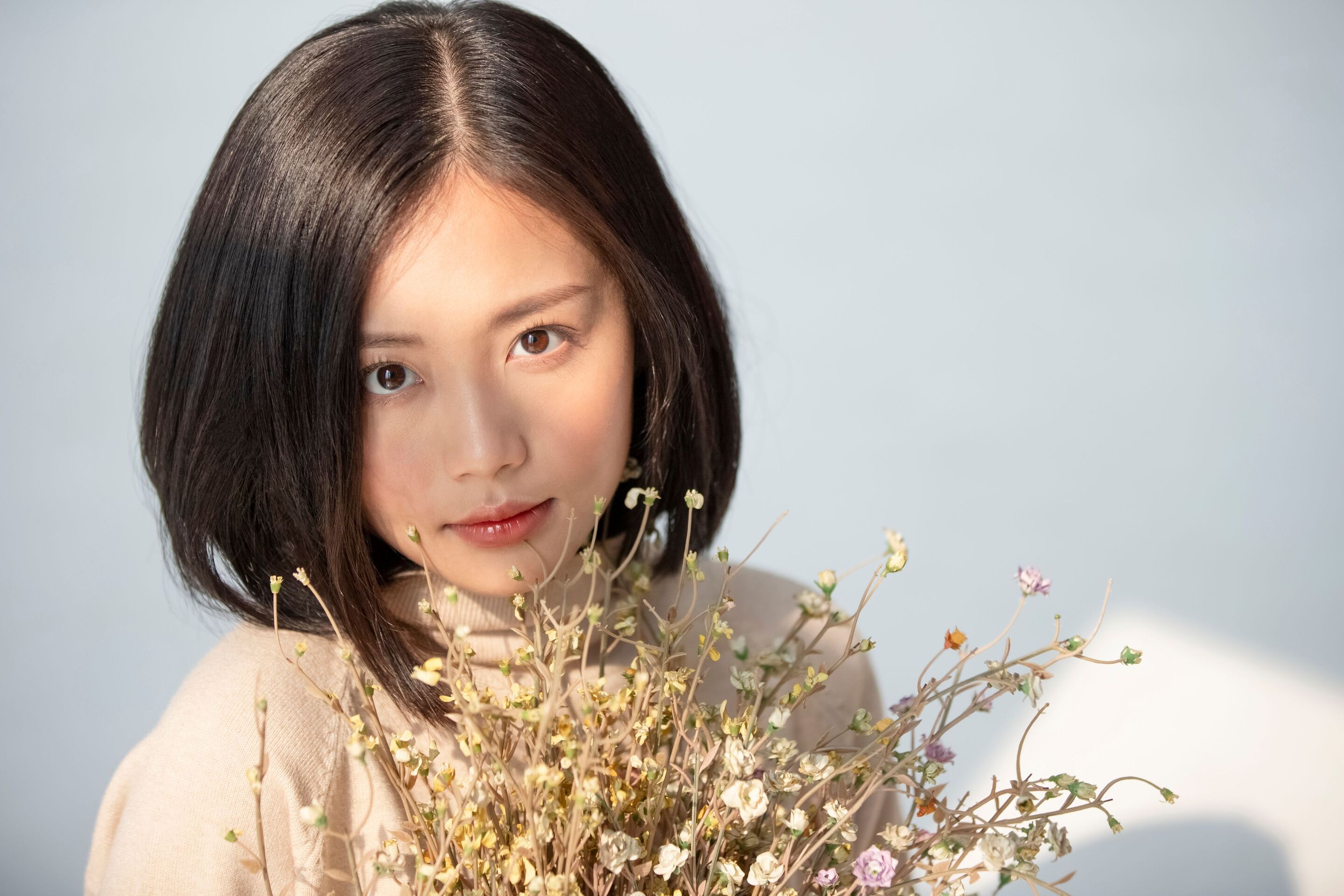 Tóc bob ngắn uốn phồng 