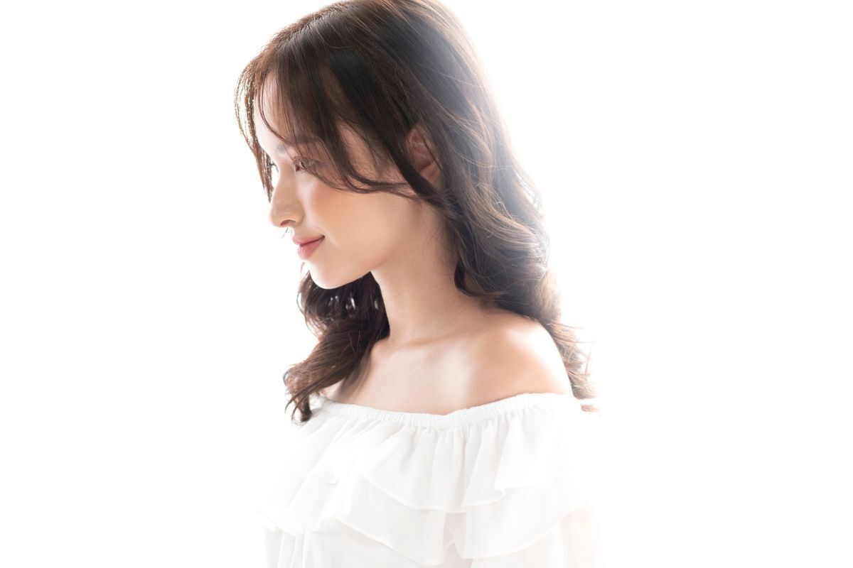 tóc layer ngang lưng uốn xoăn