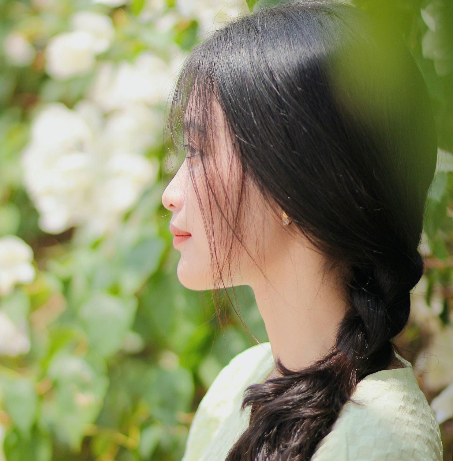 Kiểu tết tóc mặc áo dài lệch một bên