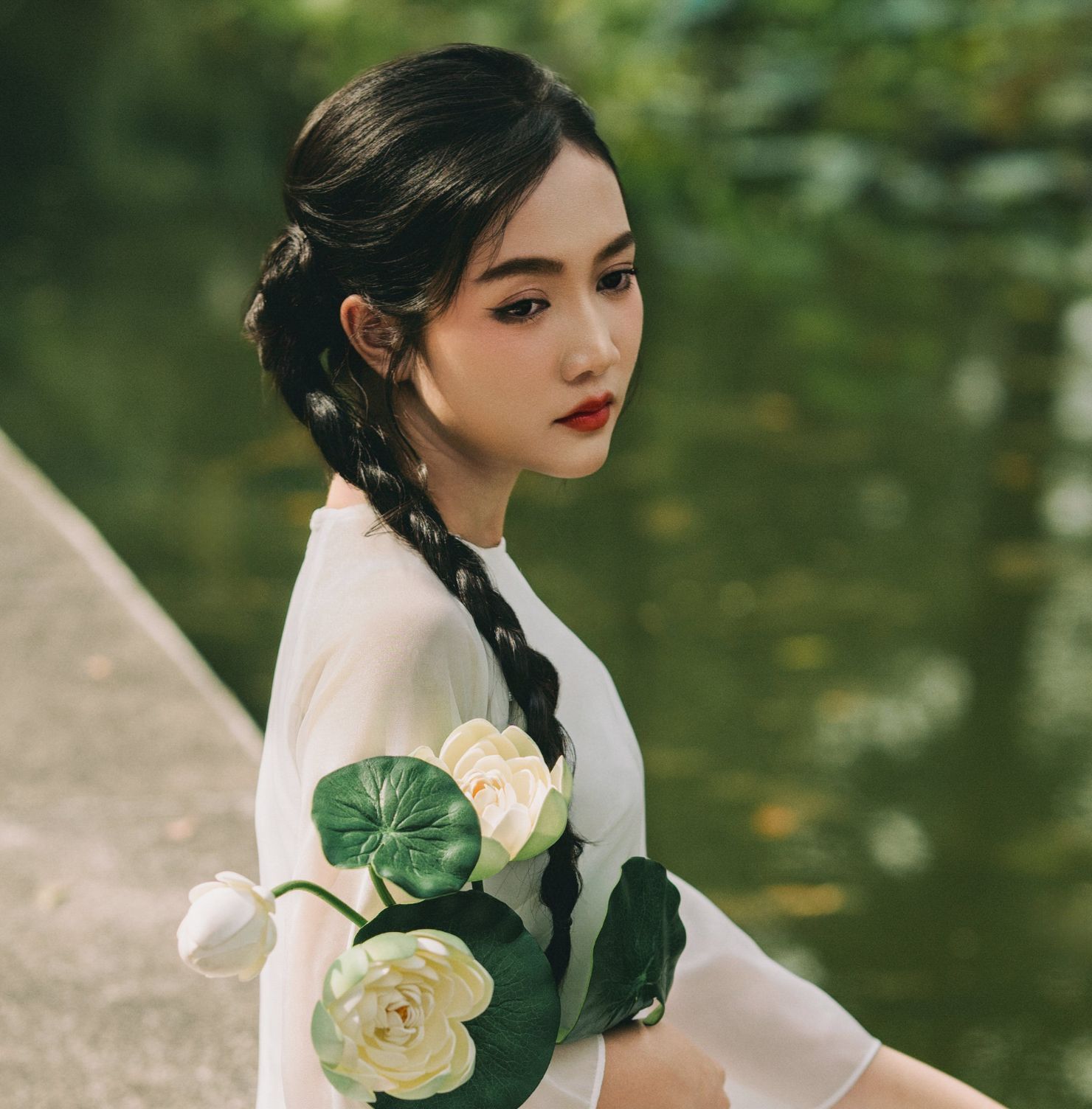 tết tóc mặc áo dài tết đuôi sam