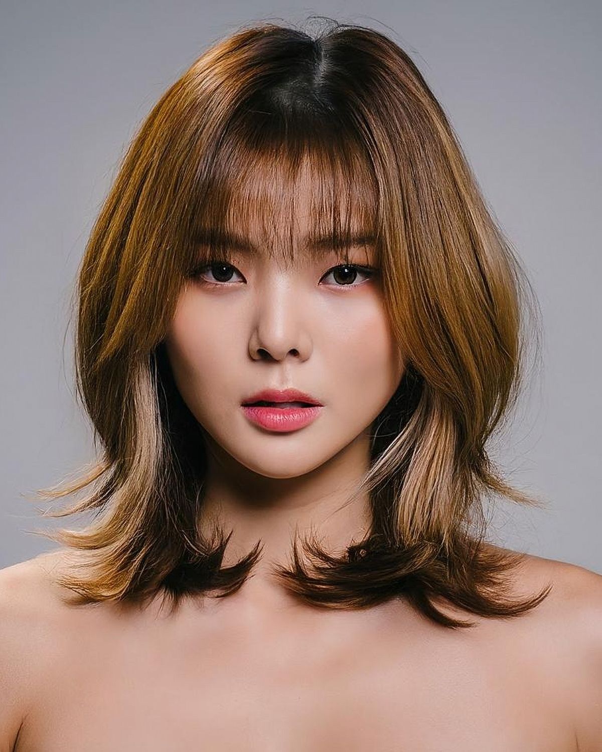 Tóc bồ câu ngang vai uốn đuôi nhẹ cho mặt trái tim