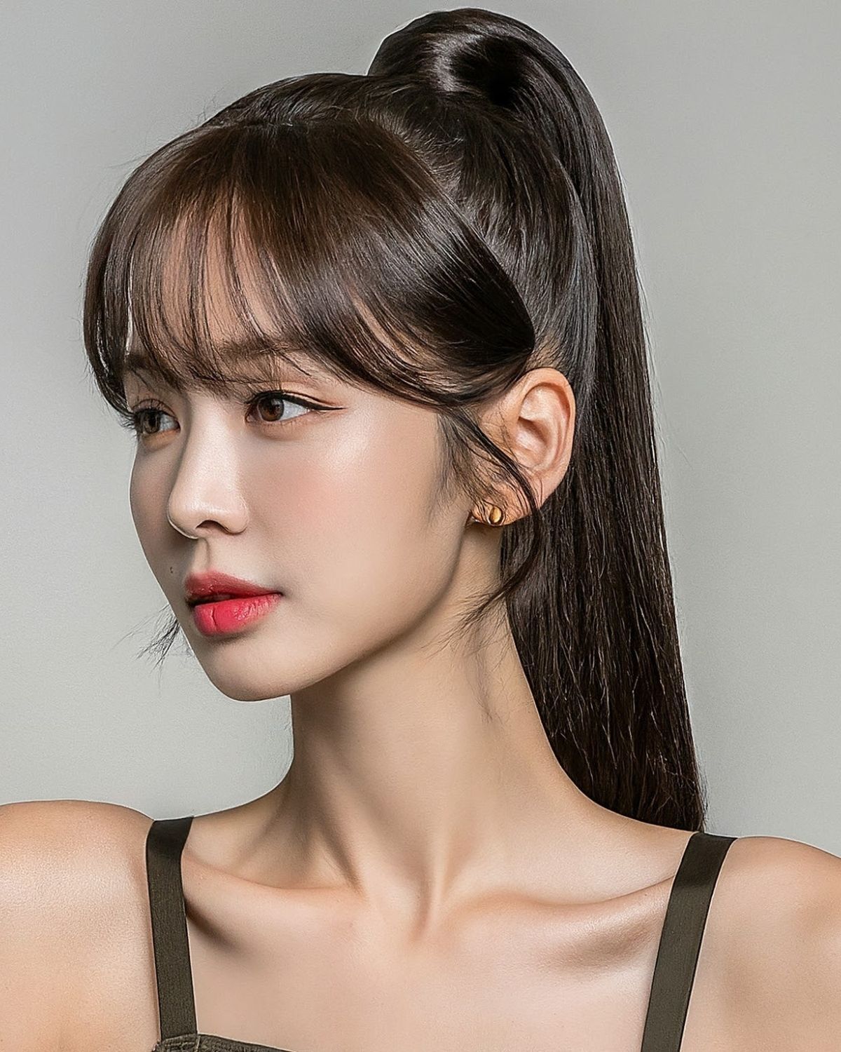 Tóc mái thưa buộc cao uốn phồng mái kiểu Hàn Quốc