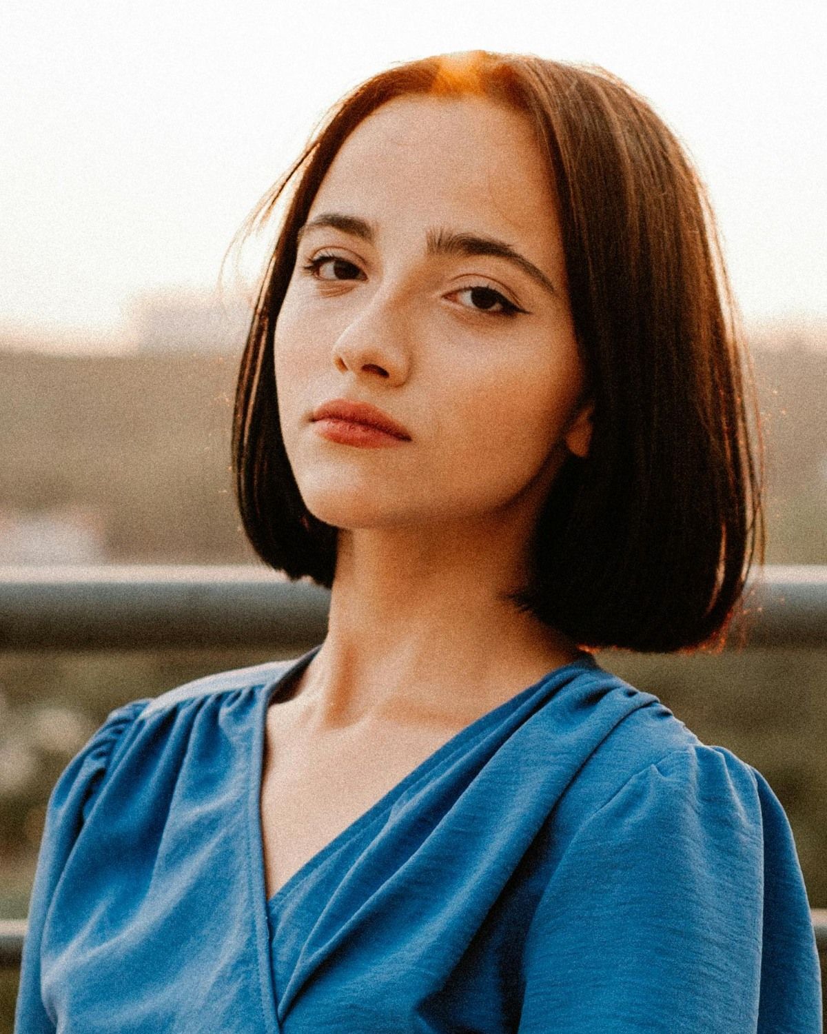 Tóc ngắn duỗi phồng