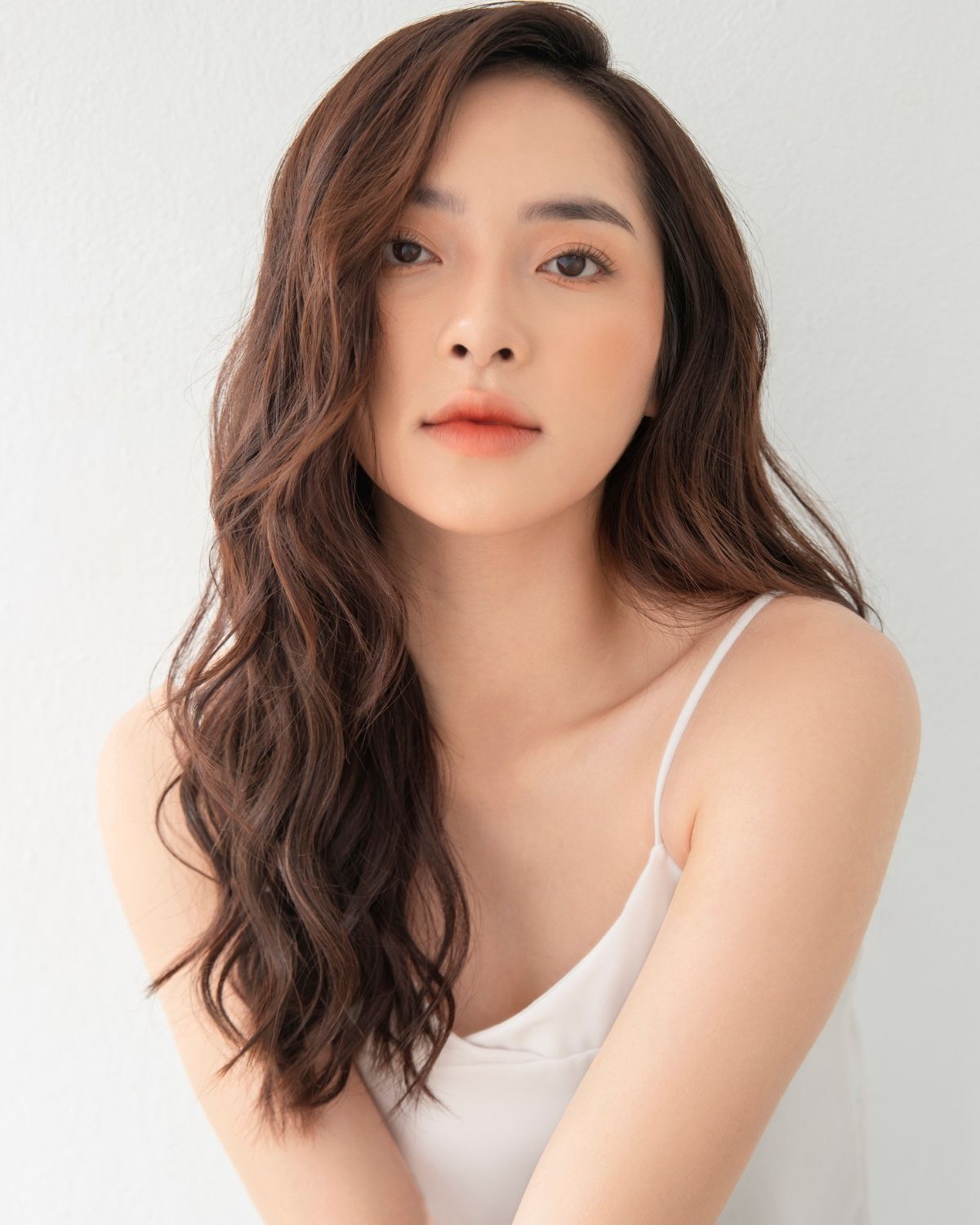 Tóc mái dài xoăn sóng nước