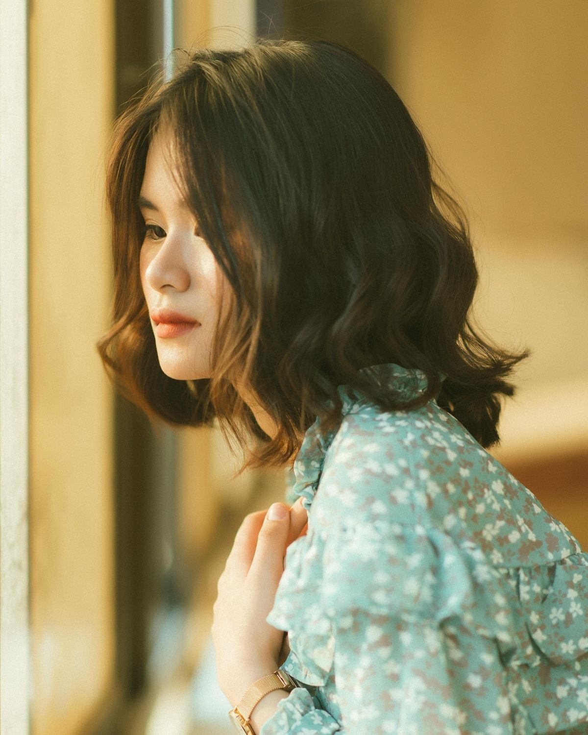 Tóc lob mái dài xoăn lơi