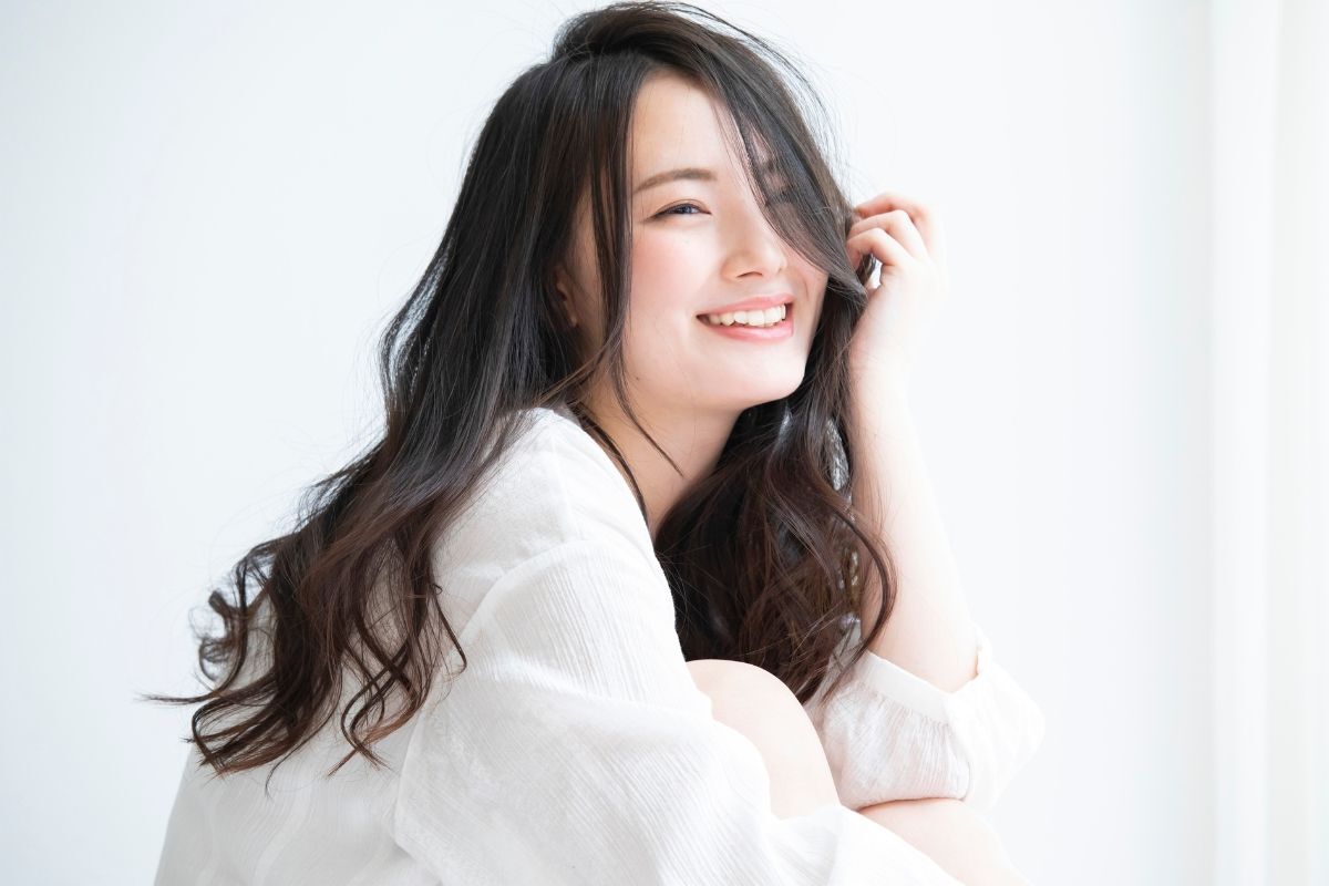  tóc mái dài xoăn đuôi