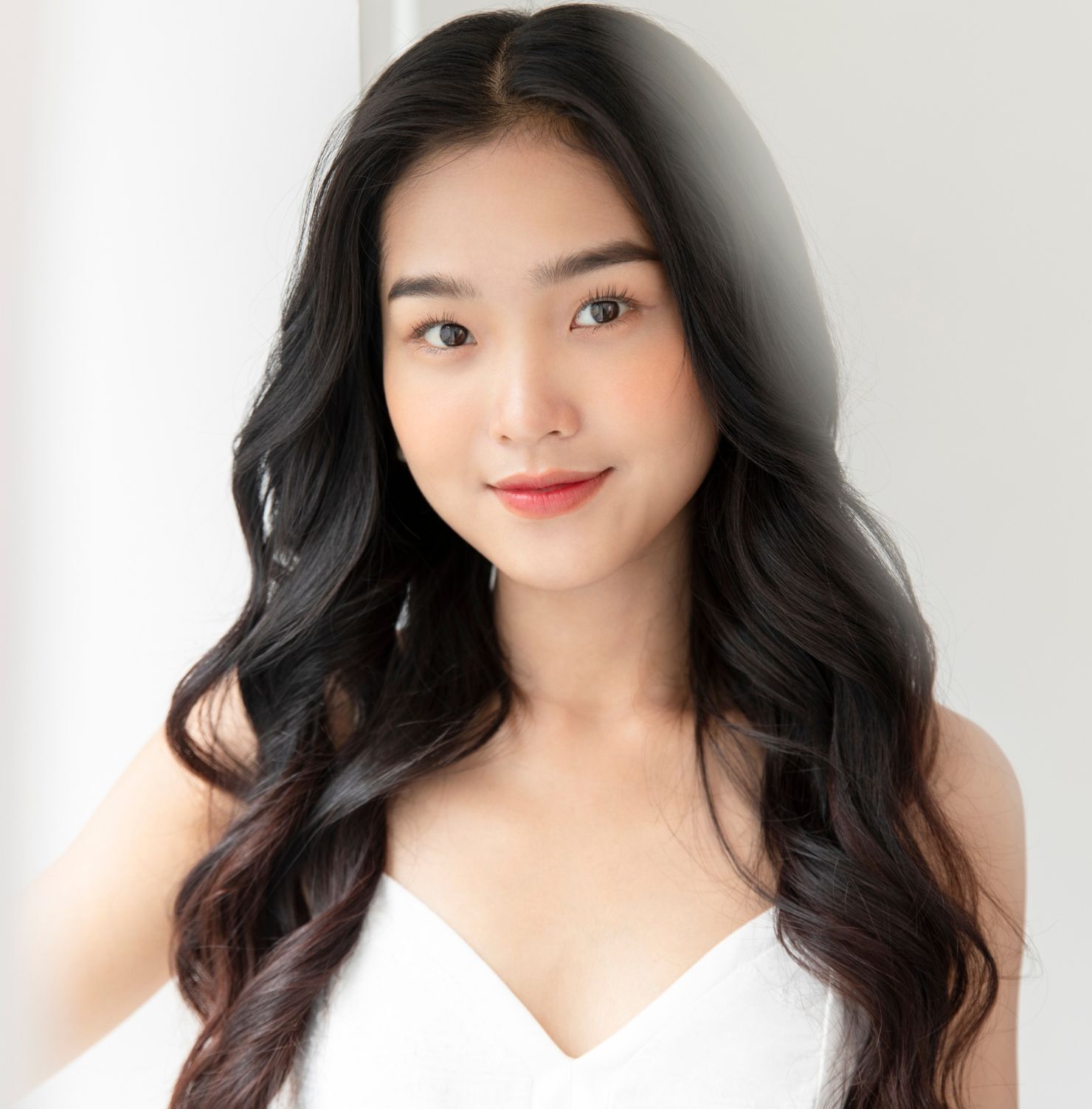 Kiểu tóc dài uốn xoăn lọn