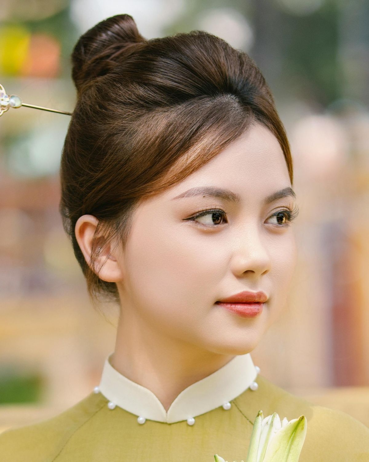 Cách búi tóc cao củ tỏi