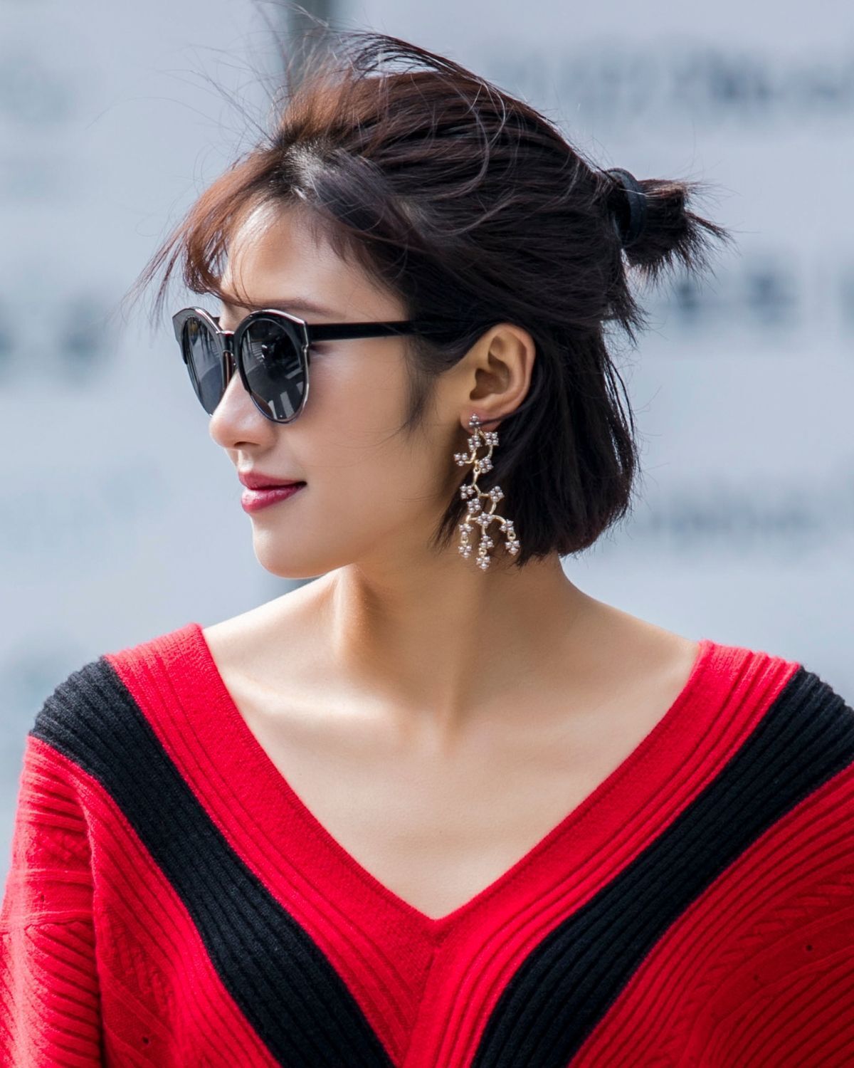 Cách búi tóc củ tỏi nửa đầu