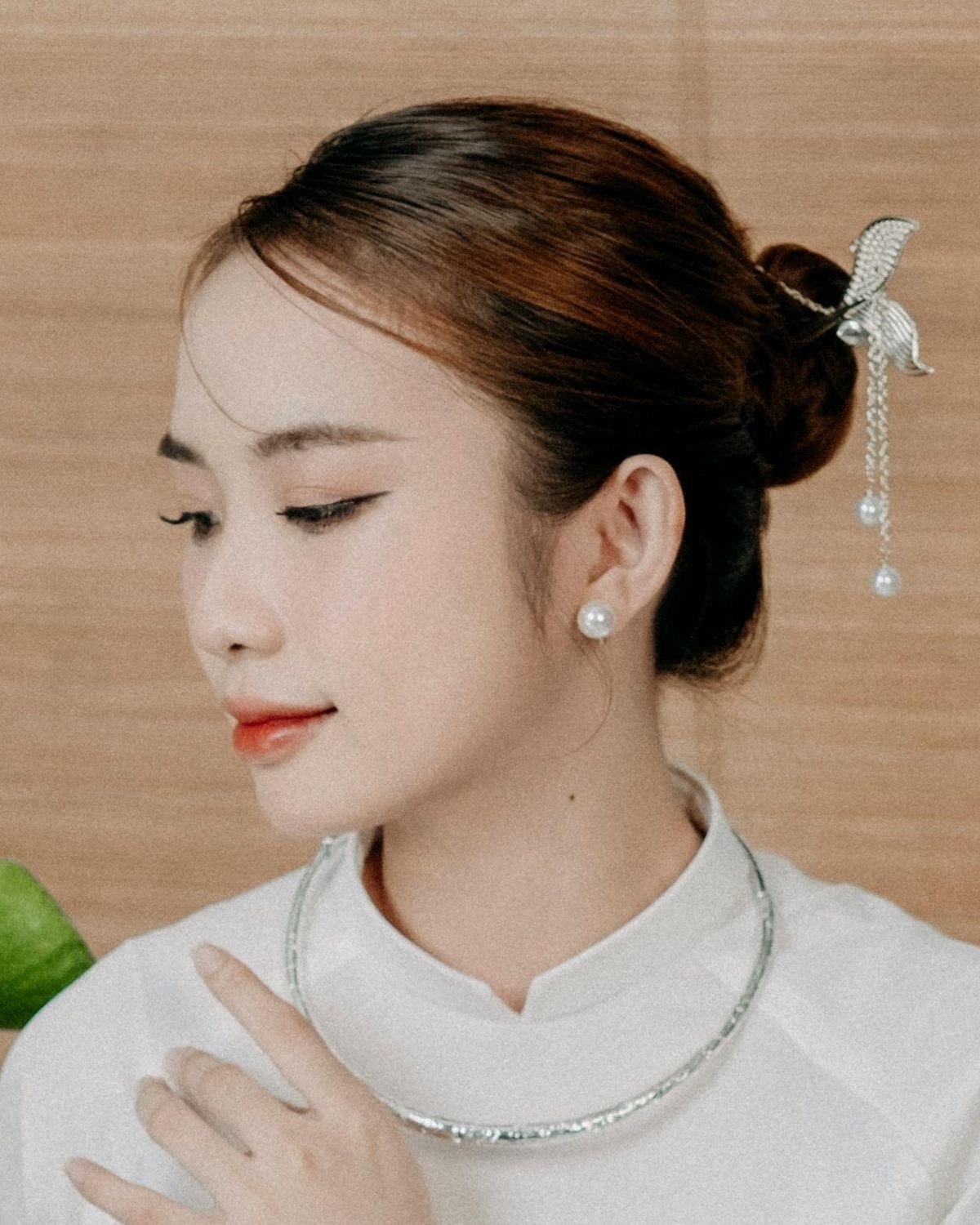 Cách búi tóc củ tỏi cho tóc dài