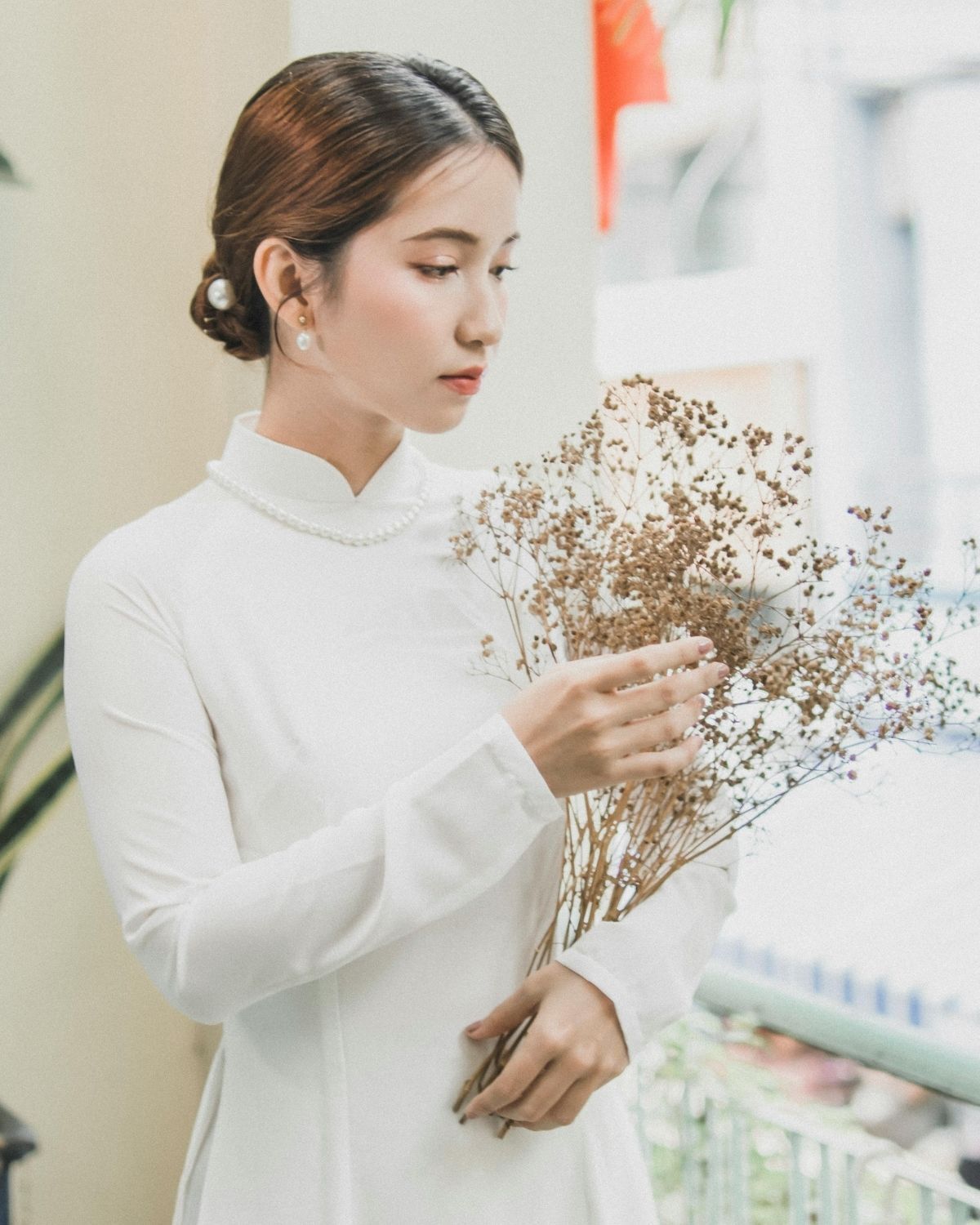 Búi tóc mặc áo dài