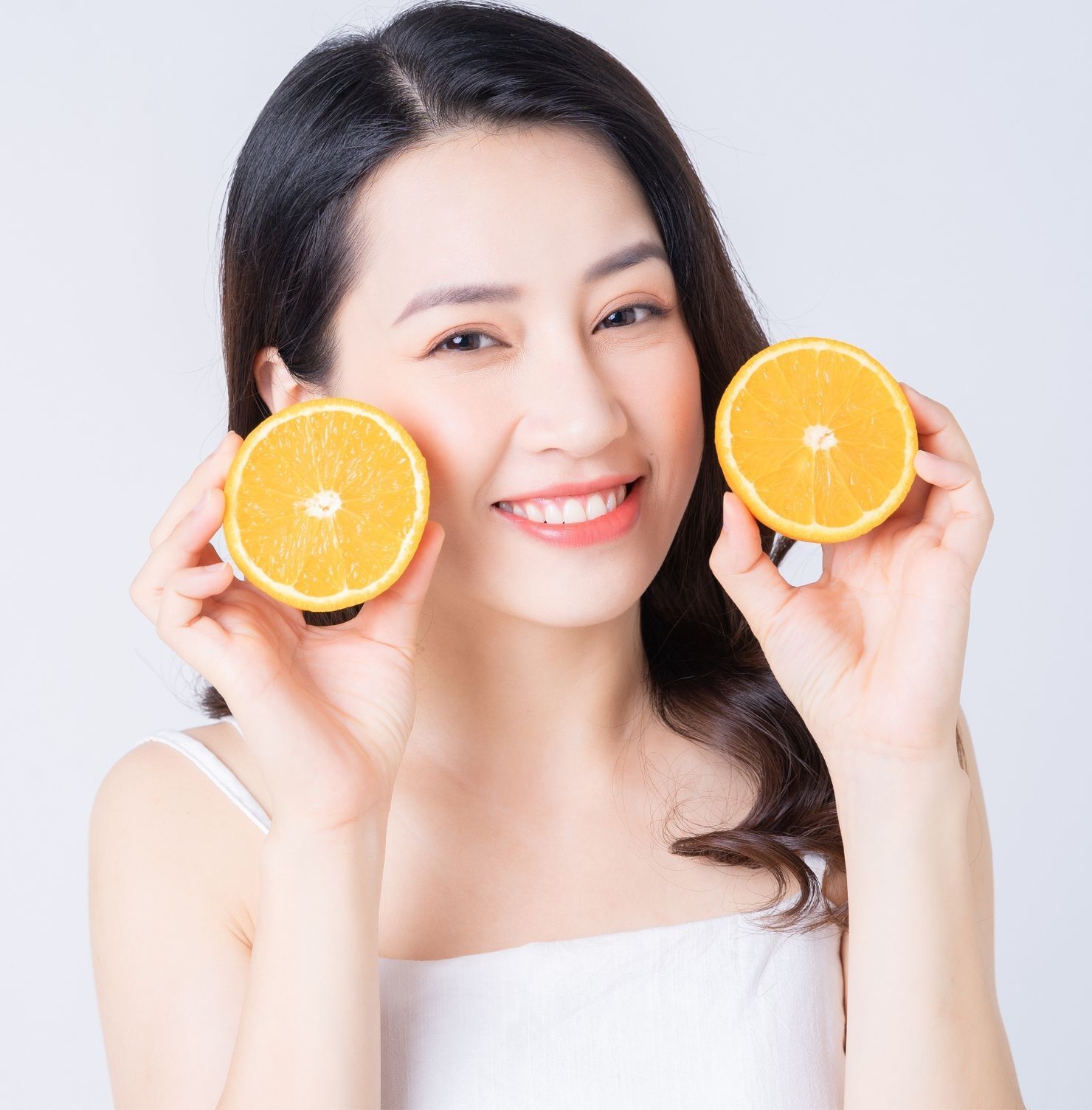 Dùng nước cam để trị thâm mông